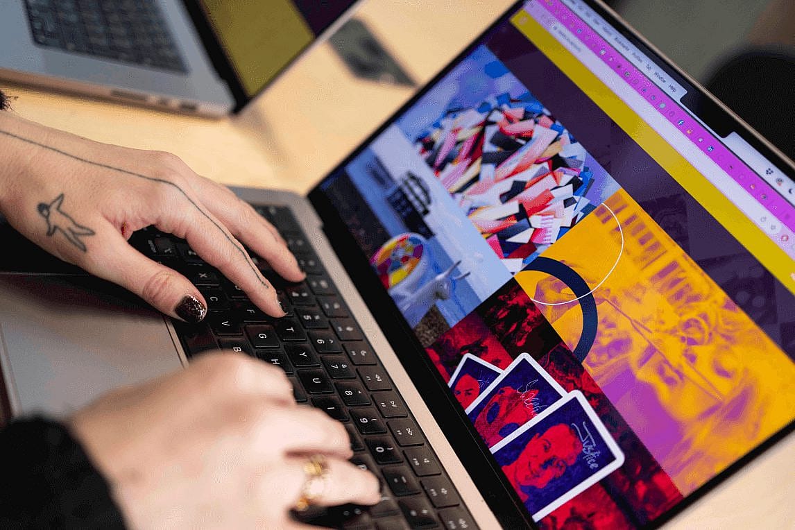 Person typing on a laptop